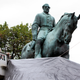 City workers drape a tarp over the statue of Confederate Gen. Robert E. Lee in Emancipation Park in Charlottesville, Va., on Aug. 23, 2017. (Steve Helber/AP Images)